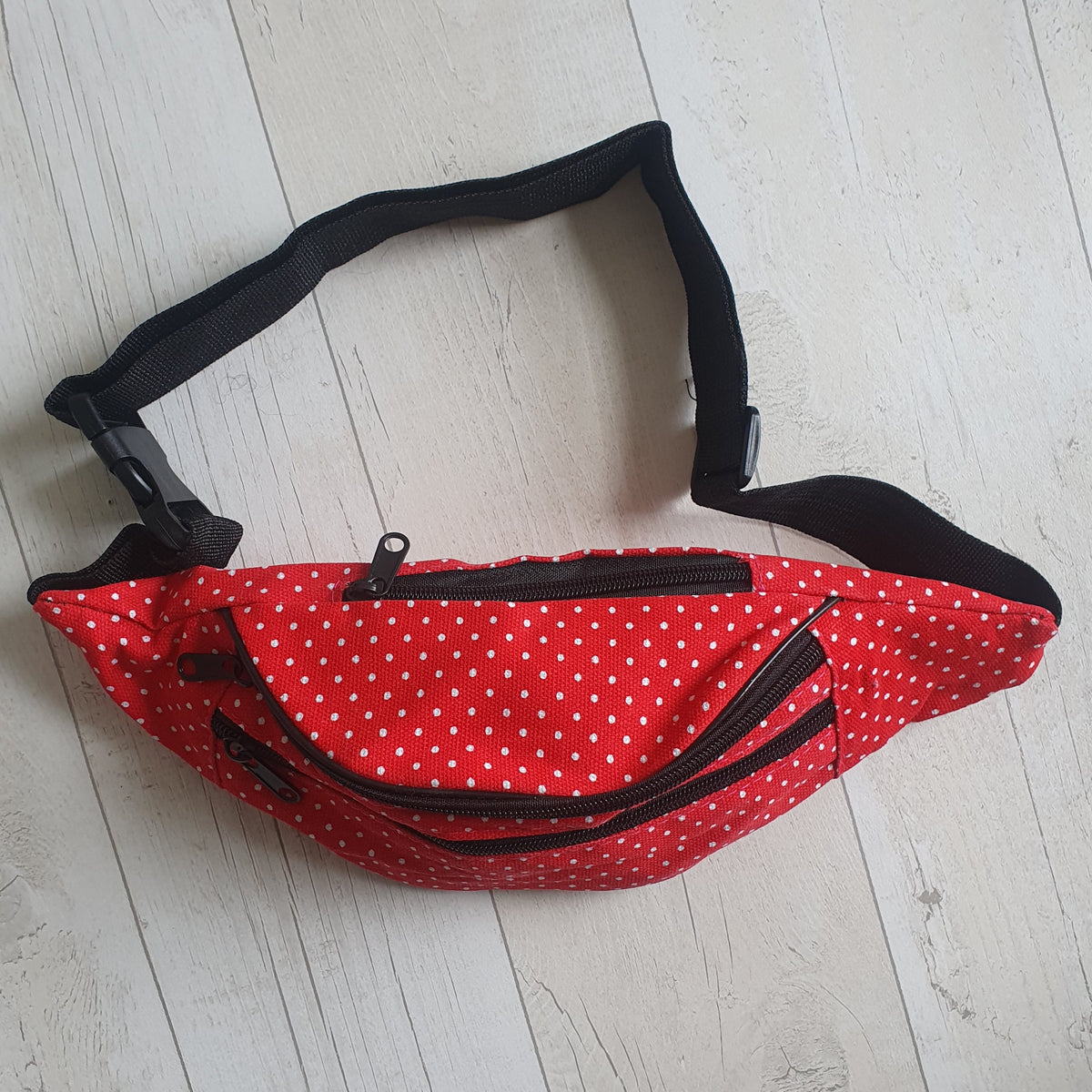 Red and 2025 black fanny pack